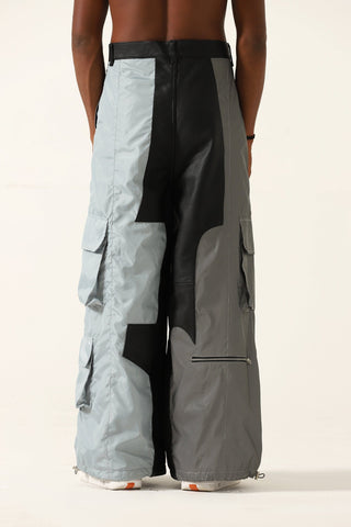 "2001" paneled leather/nylon pants