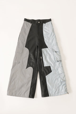"2001" paneled leather/nylon pants