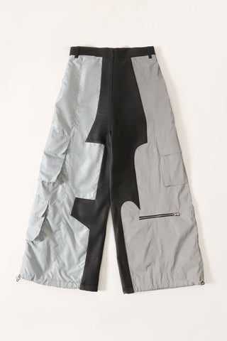 "2001" paneled leather/nylon pants