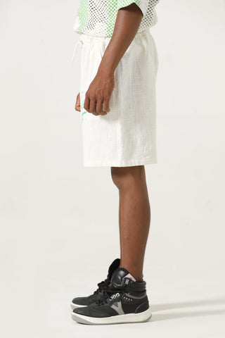 Handwoven green logo shorts