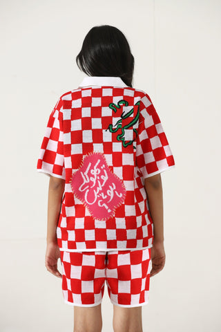 "Playful past" knit polo