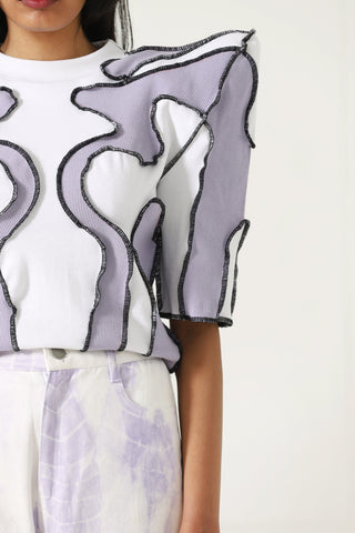Upcycled paneled top
