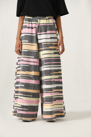 "Life is loading" handwoven trousers