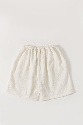 Handwoven green logo shorts