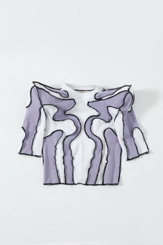 Upcycled paneled top