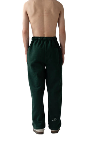 Rastah emerald green heavyweight terry knit sweatpants with elastic waistband and embroidered logo, back view.