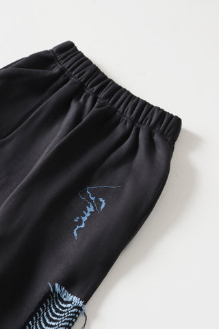 Handwoven patch sweatpants