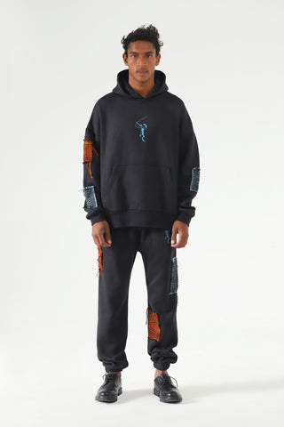 Handwoven patch sweatpants