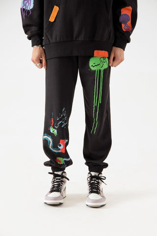 "DISTORTION AMONG US" HAND PRINTED SWEATPANTS - Rastah