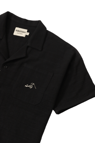 black handwoven button down