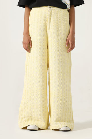 HANDWOVEN FLARED DOBBY TROUSERS